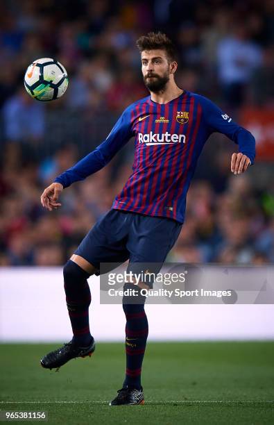 Gerard Pique of Barcelona in action during the La Liga match between Barcelona and Real Sociedad at Camp Nou on May 20, 2018 in Barcelona, Spain.