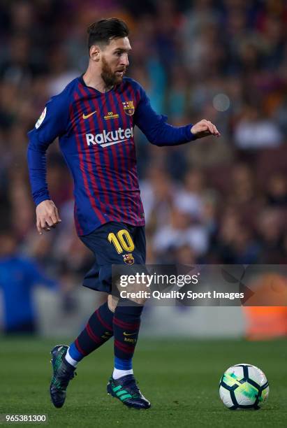 Lionel Messi of Barcelona in action during the La Liga match between Barcelona and Real Sociedad at Camp Nou on May 20, 2018 in Barcelona, Spain.