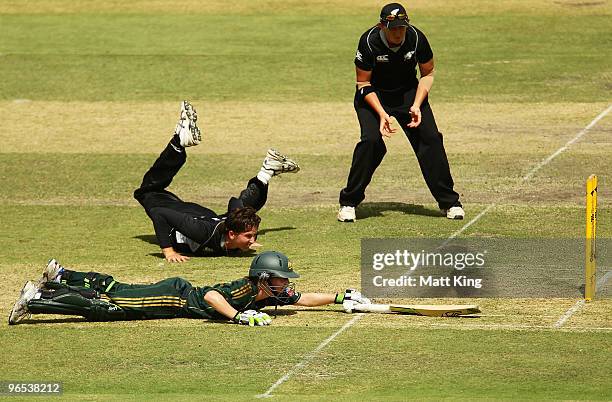 Rachael Haynes of Australia evades a run out by Nicola Browne of New Zealand during the First Women's One Day International match between the...