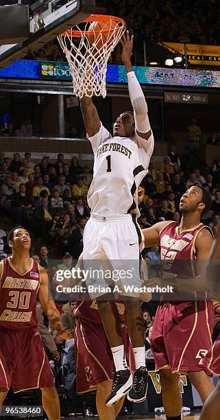 Al-Farouq Aminu of the Wake Forest Demon Deacons lays in two of his team-high 22 points during first-half action against the Boston College Eagles on...