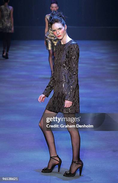 Model showcases designs by Scanlan & Theodore on the catwalk during the David Jones Autumn/Winter 2010 Fashion Launch at the Hordern Pavilion on...