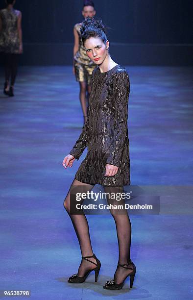 Model showcases designs by Scanlan & Theodore on the catwalk during the David Jones Autumn/Winter 2010 Fashion Launch at the Hordern Pavilion on...