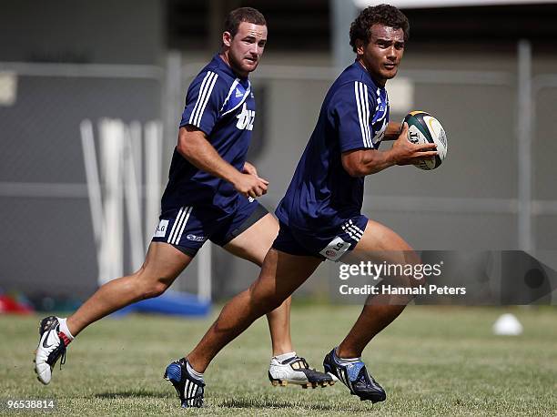 Benson Stanley looks to pass the ball out during a Blues Super 14 training session at Unitec on February 10, 2010 in Auckland, New Zealand.