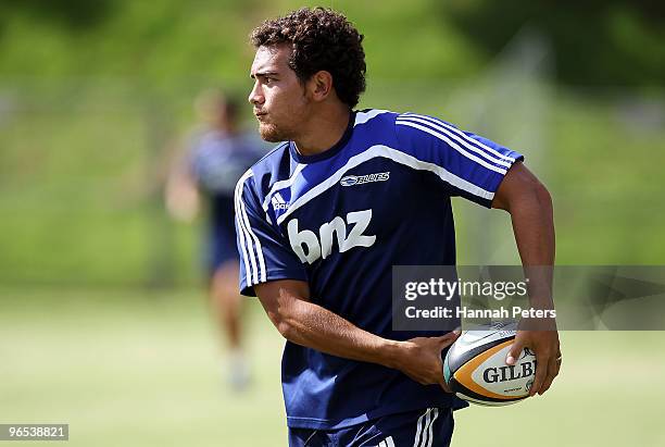 Benson Stanley looks to pass the ball during a Blues Super 14 training session at Unitec on February 10, 2010 in Auckland, New Zealand.