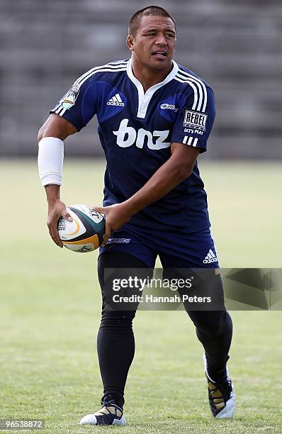 Keven Mealamu looks to pass the ball during a Blues Super 14 training session at Unitec on February 10, 2010 in Auckland, New Zealand.