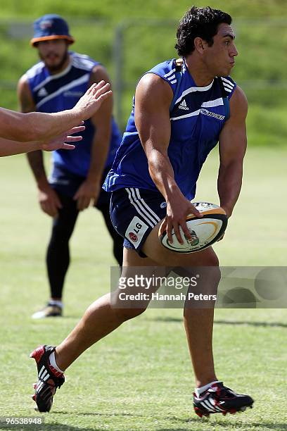 Daniel Kirkpatrick looks to offload the ball during a Blues Super 14 training session at Unitec on February 10, 2010 in Auckland, New Zealand.