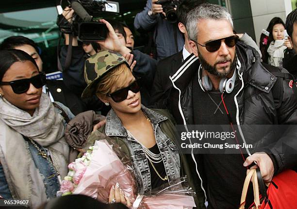 Singer Rihanna arrives at Gimpo International Airport on February 10 in Seoul, South Korea. Rihanna is in South Korea to promote her recent album...