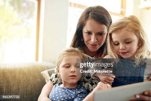Family Fun Learning Family Makes Learning Time Fun Time High-Res Stock Photo - Getty Images