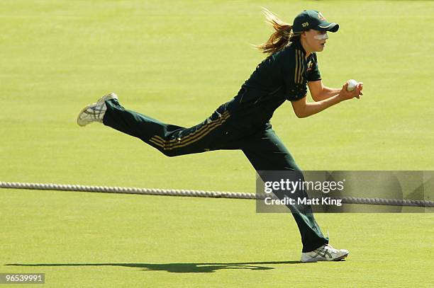 Ellyse Perry of Australia takes a diving catch in the outfield during the First Women's One Day International match between the Australian Southern...