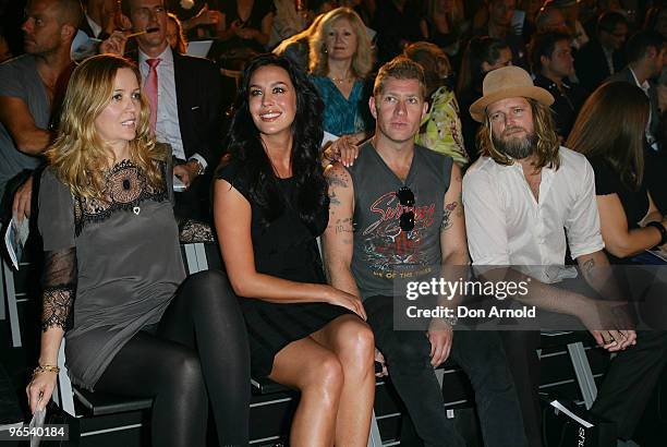 Megan Gale , Dan Single and George Gorrow sit in the front row just prior to the David Jones Autumn/Winter 2010 Fashion Launch at Hordern Pavilion on...