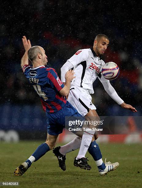 Shaun Derry of Palace tussles with Darren Pratley of Swansea during the Coca-Cola Championship match between Crystal Palace and Swansea City at...