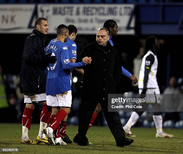 Avram Grant Manager of Portsmouth shakes hands with Nadir Belhaddj at the end of the Barclays Premier League match between Portsmouth and Sunderland...