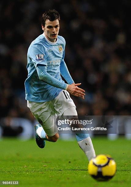 Adam Johnson of Manchester City in action during the Barclays Premier League match between Manchester City and Bolton Wanderers at the City of...