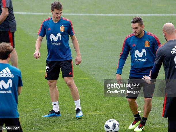 Koke Resurreccion of Spain and Cesar Azpilicueta of Spain look on during a training session on May 29, 2018 in Madrid, Spain.