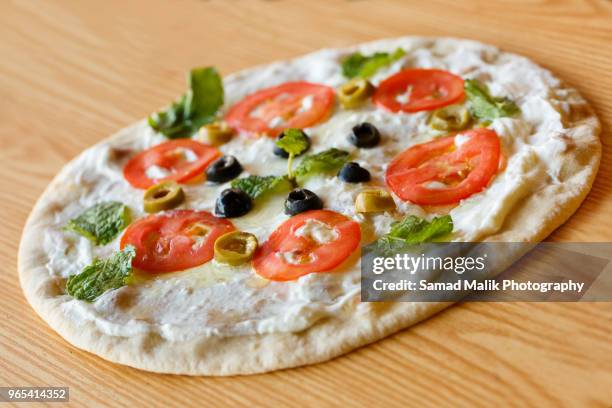 Adnan Roti 317 Naan Roti Stock Photos, High-Res Pictures, and Images - Getty Images