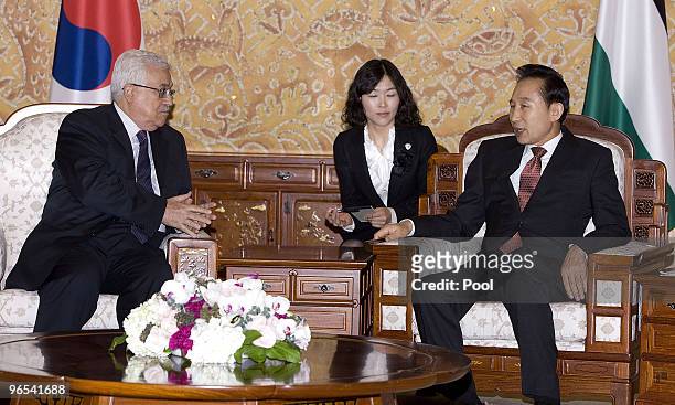 Palestinian President Mahmoud Abbas talks with South Korean President Lee Myung-Bak at the presidential blue palace on February 10, 2010 in Seoul,...