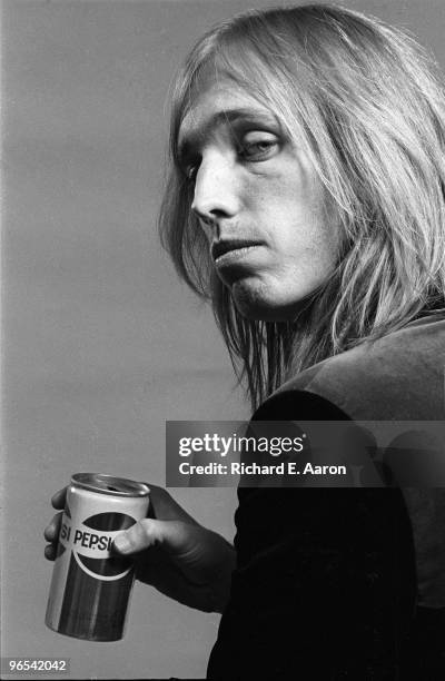 Tom Petty from Tom Petty and the Heartbreakers posed drinking a can of Pepsi in New York in 1976