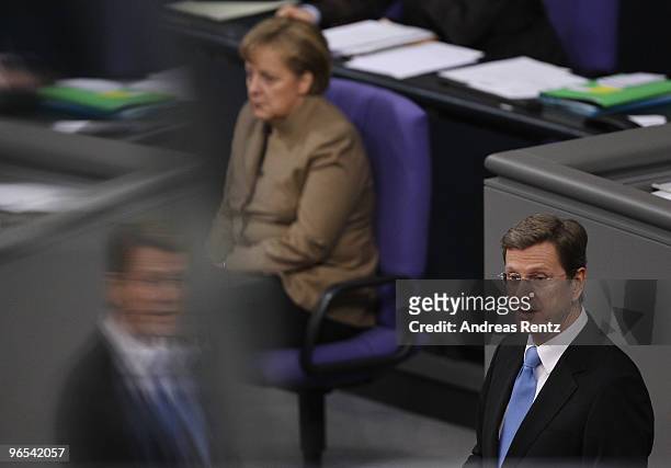 German Vice Chancellor and Foreign Minister Guido Westerwelle delivers his speech during a session at the German Parliament at the Reichstag building...