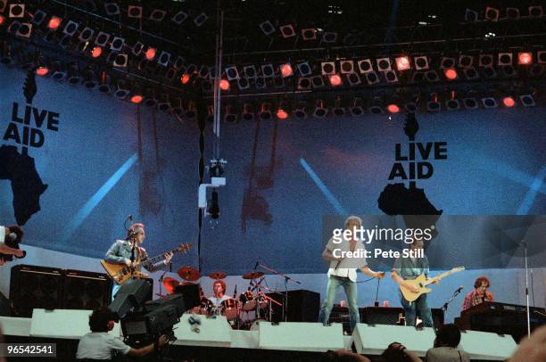 John Entwistle, Kenney Jones, Roger Daltrey and Pete Townshend of The Who perform on stage at Live Aid in Wembley Stadium on July 13th, 1985 in...