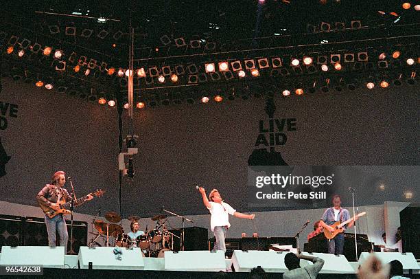 John Entwistle, Kenney Jones, Roger Daltrey and Pete Townshend of The Who perform on stage at Live Aid in Wembley Stadium on July 13th, 1985 in...