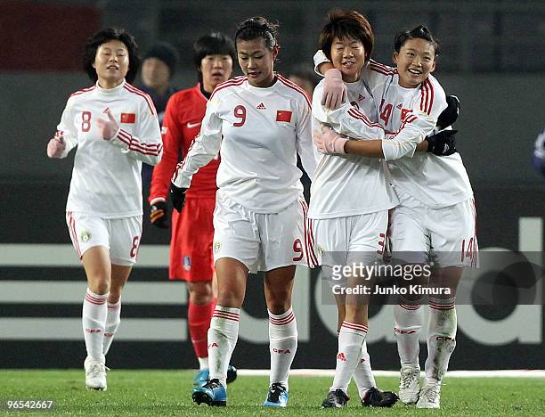 Fan Yuan of China celebrates with her teammates after scoring a goal during the East Asian Football Federation Women's Championship 2010 match...