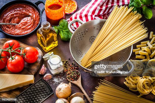 ingredients for cooking italian pasta - mediterranean culture stock pictures, royalty-free photos & images
