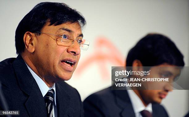 ArcelorMittal CEO Lakshmi Mittal speaks at an annual results conference beside Aditya Mittal, ArcelorMittal Chief Financial Officer at the Arcelor...