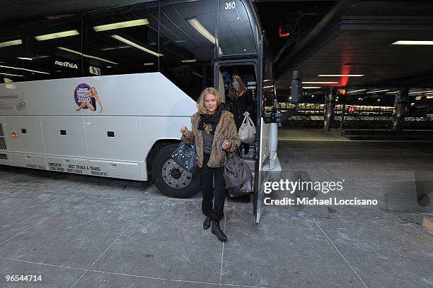 Sports Illustrated swimsuit model Esti Ginzburg comes off a shuttle bus to board the Sports Illustrated Swimsuit 24/7: New York To Las Vegas Air Tran...