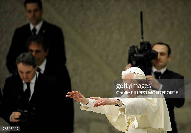 Pope Benedict XVI waves to faithful during his weekly general audience on February 10, 2010 in Paul VI Hall at the Vatican. AFP PHOTO / Filippo...