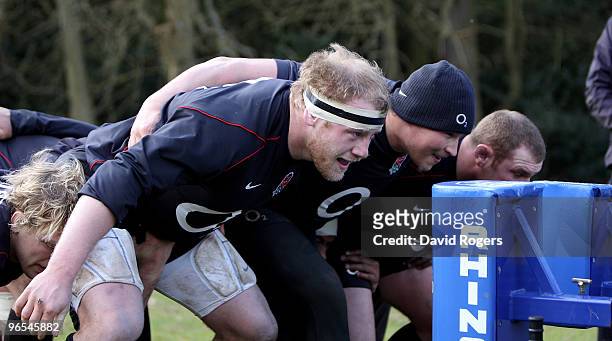 Dan Cole, the England prop, practices his scrummaging during the England training session held at Pennyhill Park on February 10, 2010 in Bagshot,...