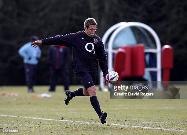 Jonny Wilkinson kicks the ball upfield during the England training session held at Pennyhill Park on February 10, 2010 in Bagshot, England.