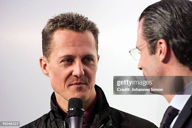 Michael Schumacher and Philippe Gaydoul, CEO of Gaydoul Group address the media during a press conference at P1 discotheque on February 10, 2010 in...