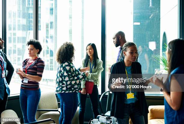 people having meeting in office - native african ethnicity stock-fotos und bilder