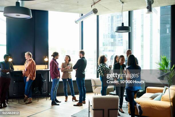 people having meeting in office - 2017 review stockfoto's en -beelden