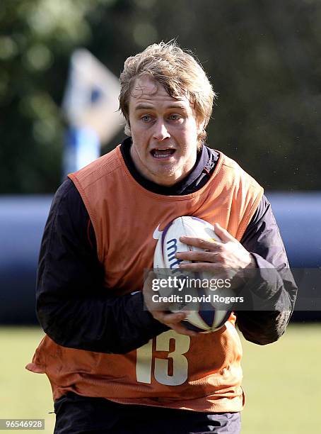 Mathew Tait runs with the ball during the England training session held at Pennyhill Park on February 10, 2010 in Bagshot, England.