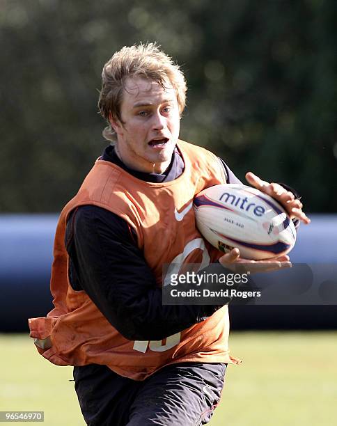 Mathew Tait runs with the ball during the England training session held at Pennyhill Park on February 10, 2010 in Bagshot, England.