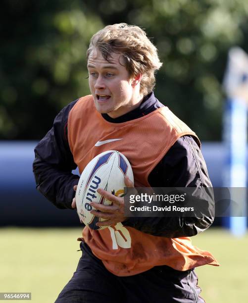 Mathew Tait runs with the ball during the England training session held at Pennyhill Park on February 10, 2010 in Bagshot, England.