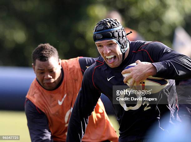 James Haskell runs with the ball during the England training session held at Pennyhill Park on February 10, 2010 in Bagshot, England.