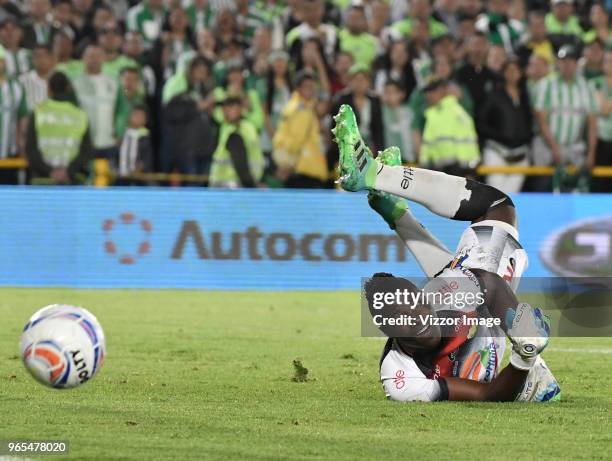 Eddie Segura goalkeeper of Huila looks the ball during semifinal first leg match between Atletico Huila and Atletico Nacional as part of Liga Aguila...