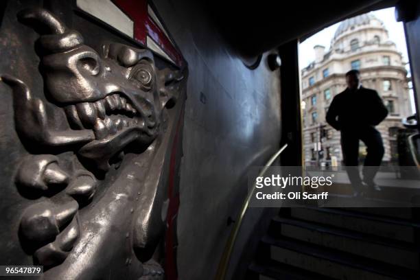 Sculpture of a dragon, taken from the City of London coat of arms, is seen at the entrance to the Bank tube station in the financial district on...
