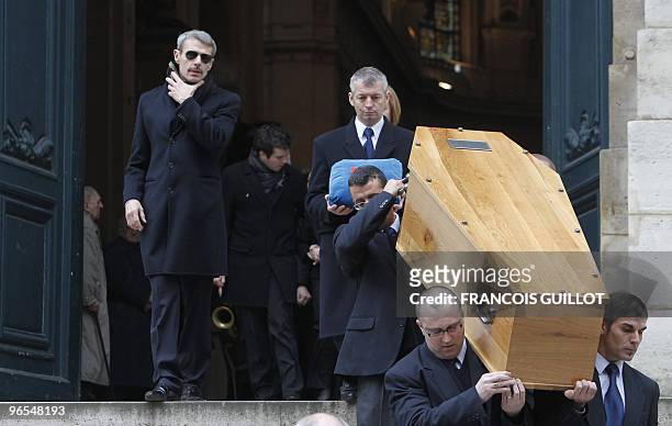 French actor Lambert Wilson leaves the Saint-Roch church following the funeral ceremony for his father, French actor and theater director Georges...