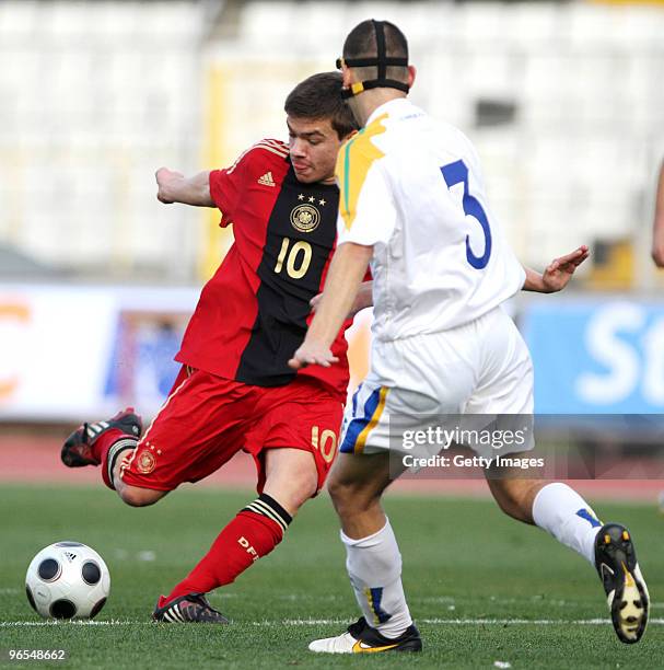 Christian Maerz of U16 Germany challenges Andreas Themistocleous of U16 Cyprus during the international friendly match between U16 Cyprus and U16...