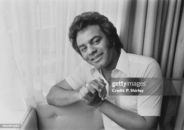 American singer Johnny Mathis posed in London on 21st August 1973.