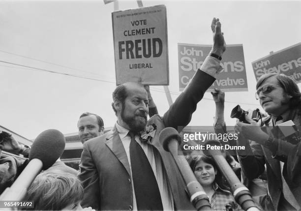 British chef and politician Clement Freud waves to supporters after winning the Isle of Ely by-election for the Liberal Party on 27th July 1973.