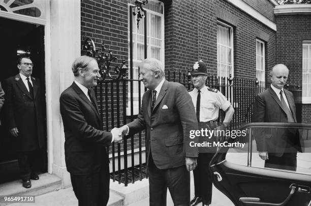 Irish Fine Gael politician and Taoiseach of Ireland, Liam Cosgrove pictured on left shaking hands with Prime Minister of the United Kingdom, Edward...