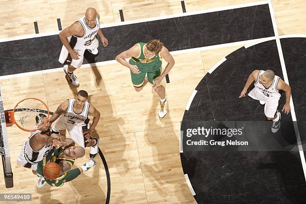 Aerial view of Utah Jazz Carlos Boozer in action vs San Antonio Spurs Tim Duncan and George Hill . San Antonio, TX 1/20/2010 CREDIT: Greg Nelson