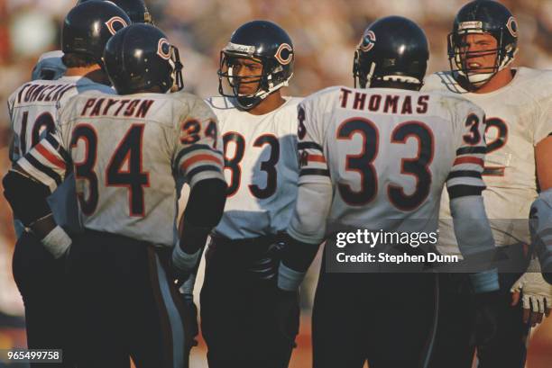 Willie Gault, Wide Receiver for the Chicago Bears in the huddle with Mike Tomczak, Walter Payton and Calvin Thomas during the American Football...