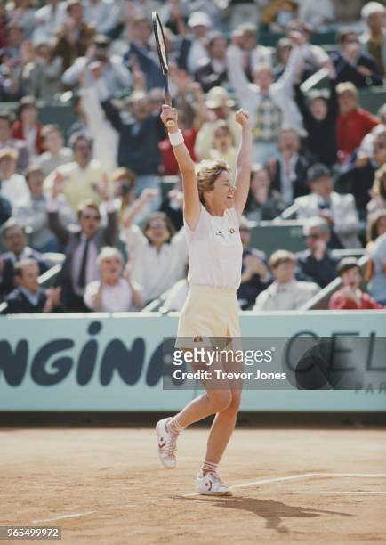 Chris Evert of the United States celebrates her victory over defending champion Martina Navratilova during their Women's Singles Final match at the...