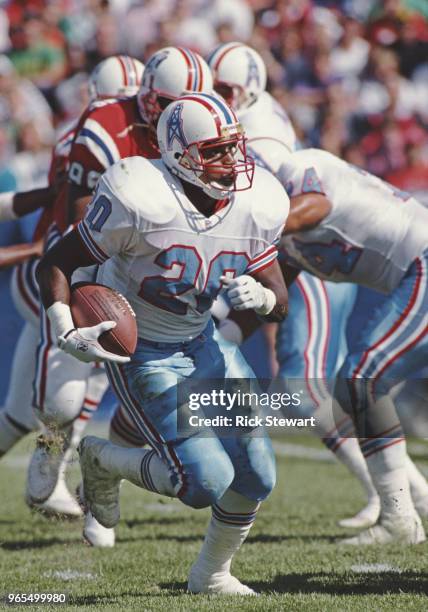 Allen Pinkett, Running Back for the Houston Oilers runs the ball during the American Football Conference East game against the New England Patriots...