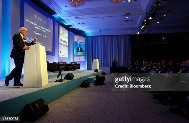 David Rubenstein, founder and managing director of the Carlyle Group, gestures while speaking at the Super Return International 2010 conference in...